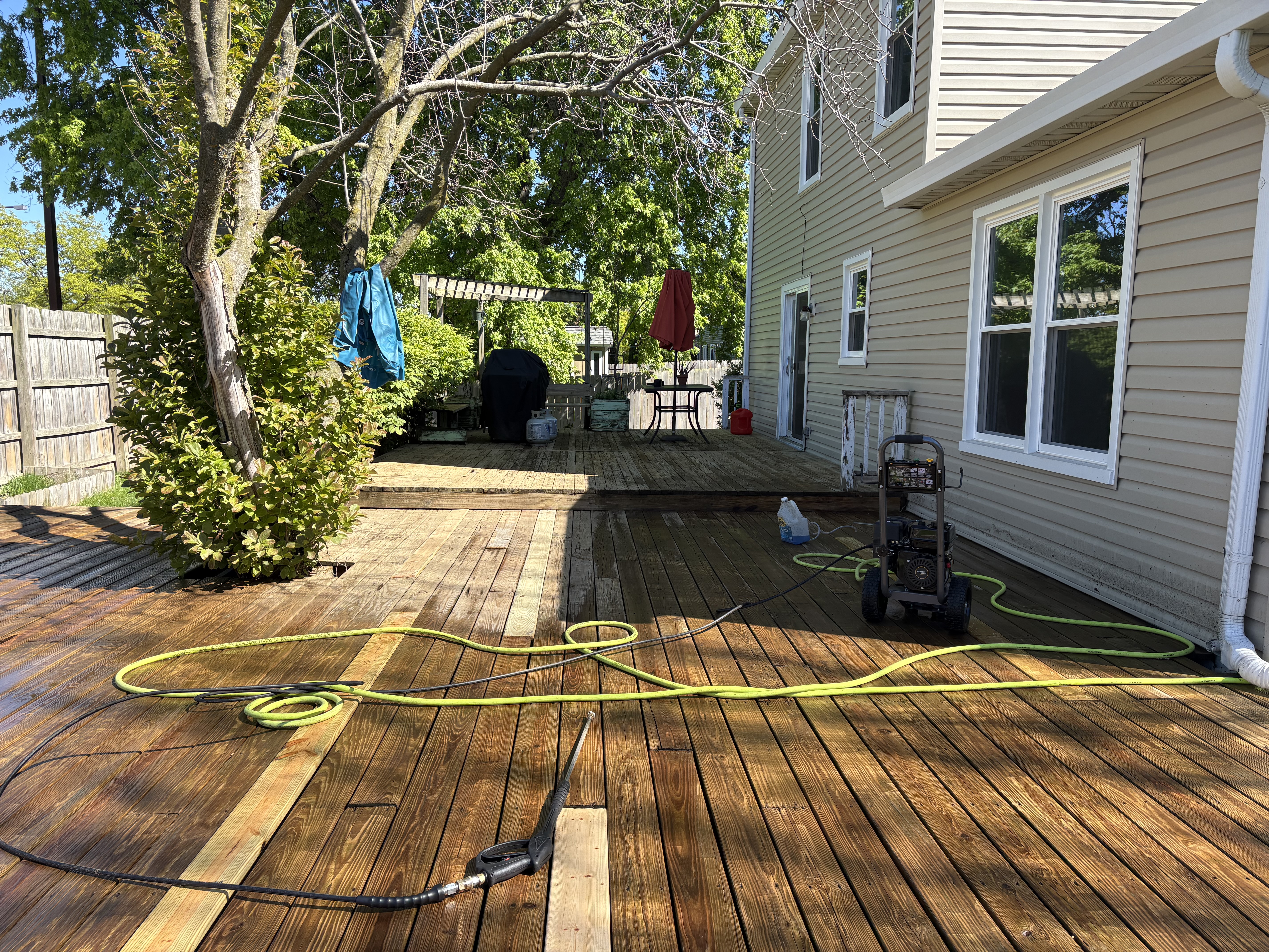 Balcony railing repainted with fresh brown finish
